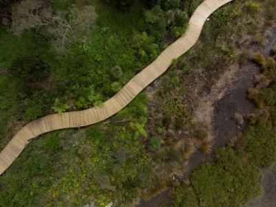 Piles for the boardwalk were helicoptered onto the site and the design considered the impact on the native vegetation. Piles for the boardwalk were helicoptered onto the site and the design considered the impact on the native vegetation.